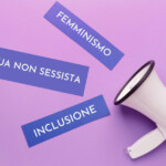 Un megafono dal quale escono le scritte "Femminismo", "Lingua non sessista" e "inclusione"